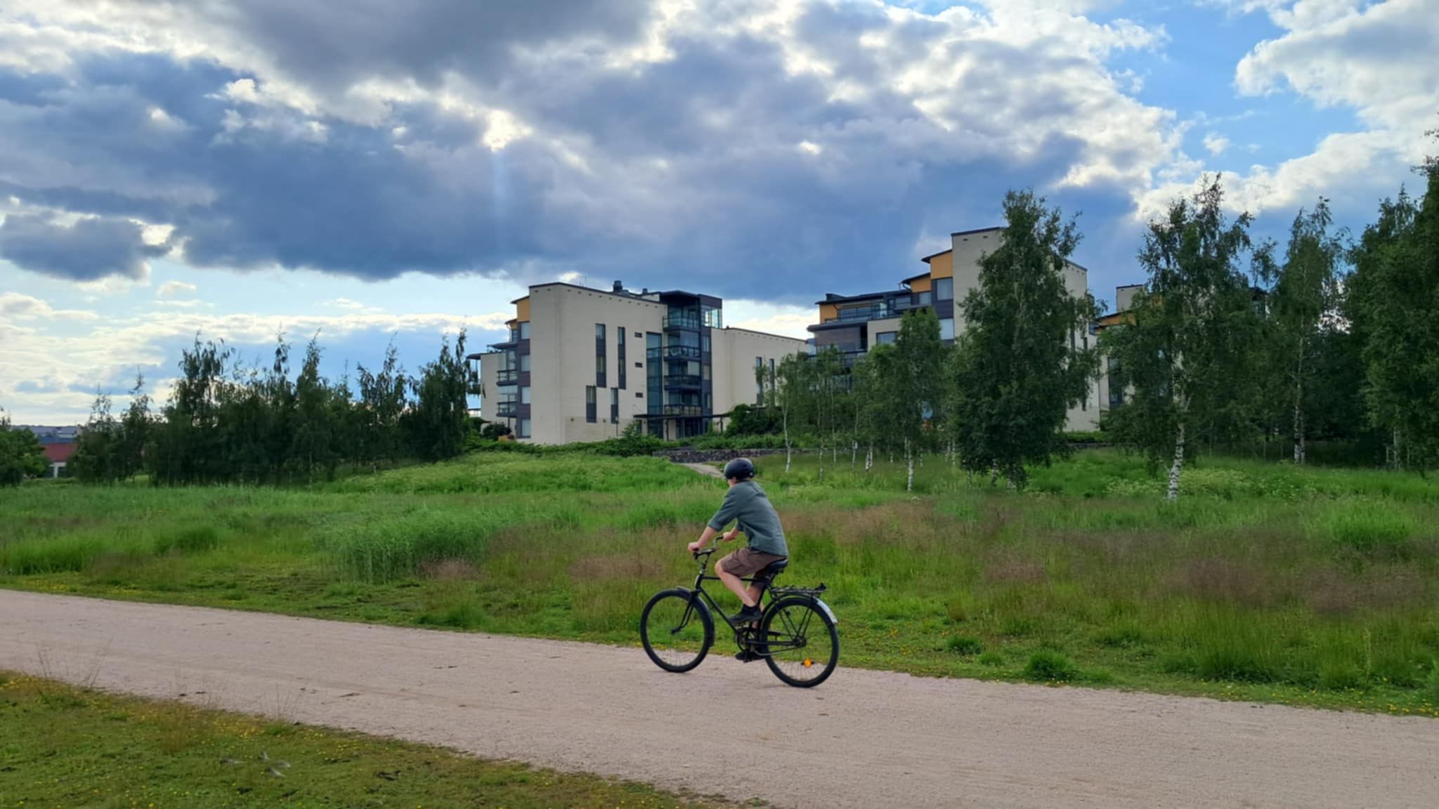 bicyclist in the park for illustrating article about passive voice in academic writing